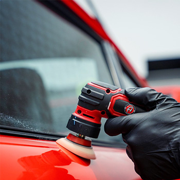 Auto Detailing Door of a Red Sports Car Auto Detailing Door of a Red Sports Car